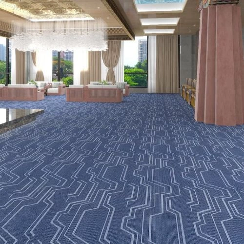 Soft beige wall-to-wall carpet texture.